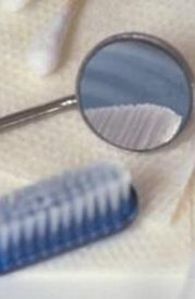 Toothbrush and dental mirror